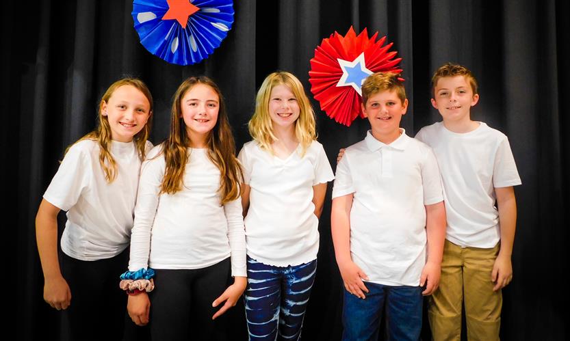 Students sing in Veterans Day performance